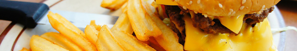 Eating Burger at Bing's Burger Station restaurant in Cottonwood, AZ.